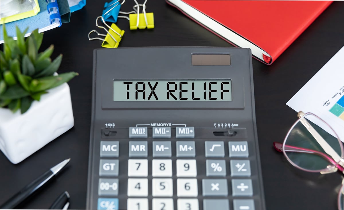 Tax relief concept with calculator